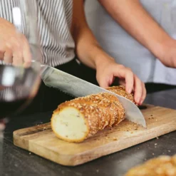 Alpha-Royal Japanese Serie 8" Brotmesser 18° Wellenschliff Damaszener-Stahl -Haushaltsgerätegeschäft 10038985 de 0003 logo